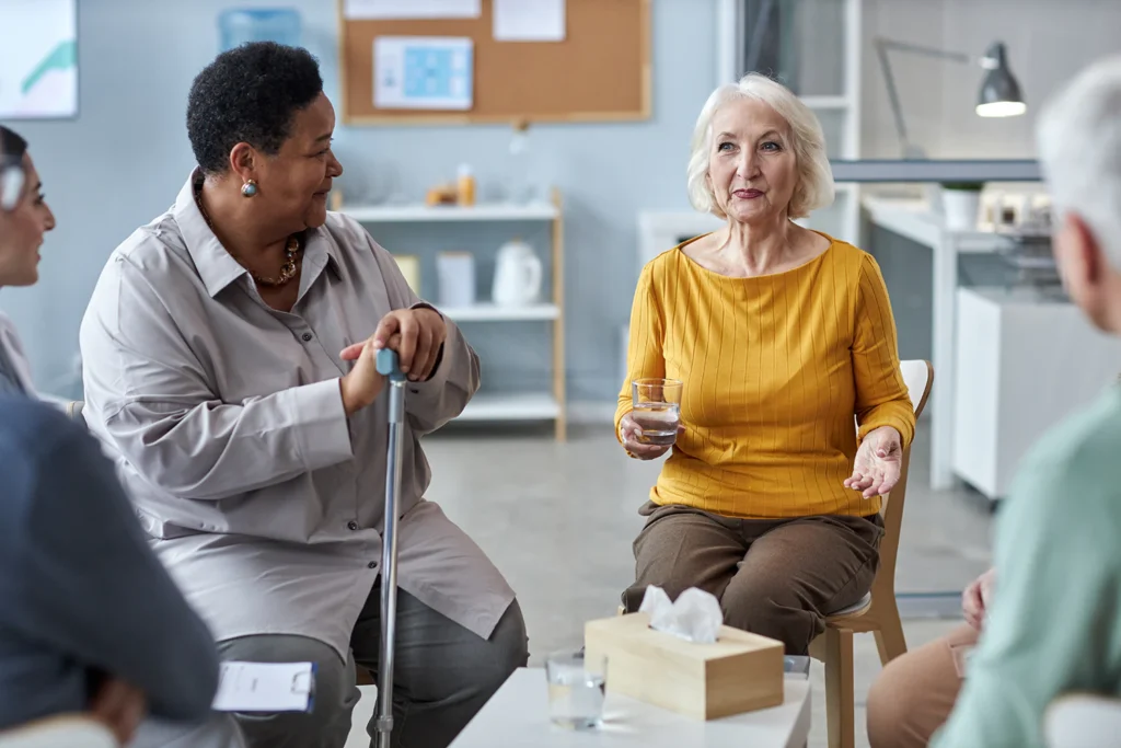 Elderly people having a meeting.