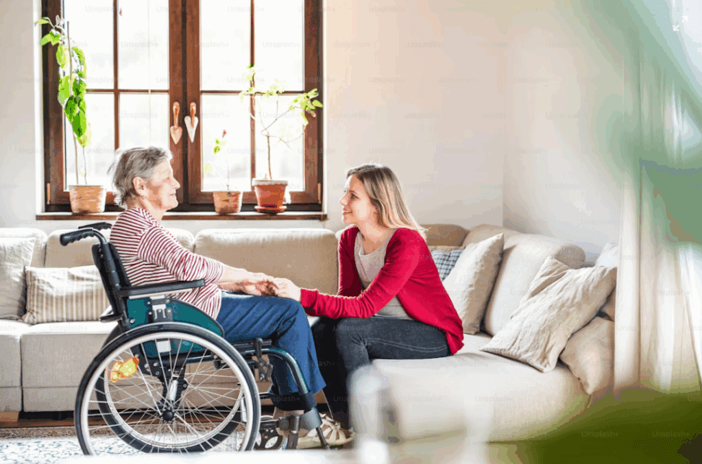 A caregiver helps a senior at home